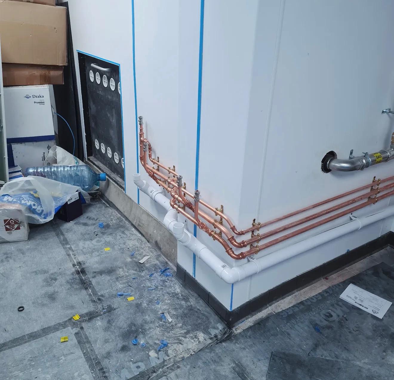 Installed copper and PVC pipework on site